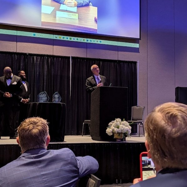 Rich Zeck speaking after receiving the Bishop Levi S. Murray Ministries Outstanding Dedication and Commitment Award